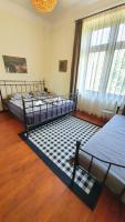 Posteľ alebo postele v izbe v ubytovaní Deák Apartman