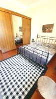 Posteľ alebo postele v izbe v ubytovaní Deák Apartman