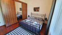 Posteľ alebo postele v izbe v ubytovaní Deák Apartman