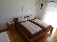 Łóżko lub łóżka w pokoju w obiekcie Landhaus Sommerau