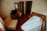 Postel nebo postele na pokoji v ubytování Hotel Central
