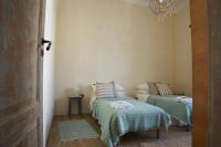 A bed or beds in a room at Ai due Mori Apt by Addler House Ospitality