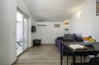 TV a/nebo společenská místnost v ubytování Apartments Jakoplić