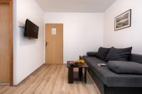 TV a/nebo společenská místnost v ubytování Apartments Jakoplić