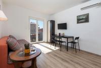 TV a/nebo společenská místnost v ubytování Apartments Jakoplić