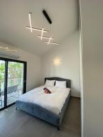 Ein Bett oder Betten in einem Zimmer der Unterkunft Top Royal Eilat רויאל פארק
