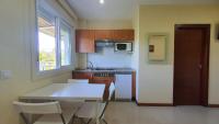 Kuchyň nebo kuchyňský kout v ubytování Sun Galicia Hotel y Apartamentos