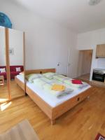 Posteľ alebo postele v izbe v ubytovaní Apartments Hellwagstraße