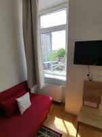 Televízia a/alebo spoločenská miestnosť v ubytovaní Apartments Hellwagstraße