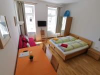 Posteľ alebo postele v izbe v ubytovaní Apartments Hellwagstraße