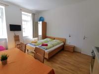 Posteľ alebo postele v izbe v ubytovaní Apartments Hellwagstraße