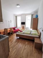 Televízia a/alebo spoločenská miestnosť v ubytovaní Apartments Hellwagstraße