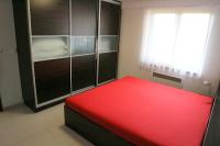 A bed or beds in a room at Panorama Donovaly 42-C