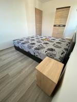 Posteľ alebo postele v izbe v ubytovaní Mifi Apartman Balatonlelle