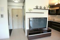 A television and/or entertainment centre at Panorama Donovaly 42-C