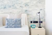 Postel nebo postele na pokoji v ubytování Hotel Lava Beach