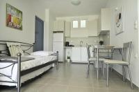 Kuchyň nebo kuchyňský kout v ubytování Isidoros Apartments