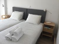 A bed or beds in a room at Oikia Ampavris