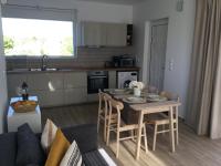 A kitchen or kitchenette at Oikia Ampavris