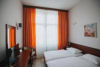 Postel nebo postele na pokoji v ubytování Hotel Central