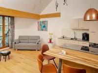 A kitchen or kitchenette at Brunnwirt ESSEN & WOHNEN