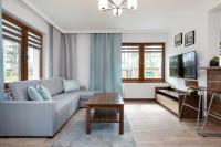 Telewizja i/lub zestaw kina domowego w obiekcie Apartamenty Krakowska