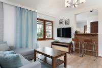 Telewizja i/lub zestaw kina domowego w obiekcie Apartamenty Krakowska