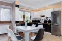 Kuchnia lub aneks kuchenny w obiekcie Apartamenty Krakowska