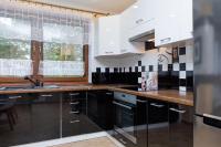Kuchnia lub aneks kuchenny w obiekcie Apartamenty Krakowska