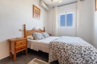 Łóżko lub łóżka w pokoju w obiekcie APARTAMENTO LUZ A