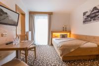Posteľ alebo postele v izbe v ubytovaní Pension Appartements Gabriele
