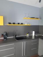 Kuchyň nebo kuchyňský kout v ubytování LUXURY SUITES
