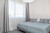 Posteľ alebo postele v izbe v ubytovaní Bianco House Apartments