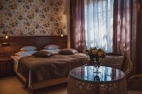 Łóżko lub łóżka w pokoju w obiekcie Żabi Dwór - HOTEL - RESTAURACJA - SPA