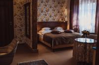 Łóżko lub łóżka w pokoju w obiekcie Żabi Dwór - HOTEL - RESTAURACJA - SPA