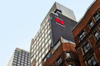 a building with a nordisk sign on the side of it at citizenM New York Times Square in New York