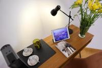 Televízia a/alebo spoločenská miestnosť v ubytovaní Palazzina B - Contemporary Studio