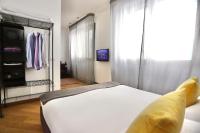Posteľ alebo postele v izbe v ubytovaní Palazzina B - Contemporary Studio