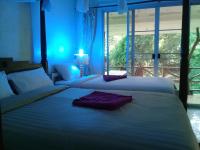 Postel nebo postele na pokoji v ubytování Lunda Orchid Resort