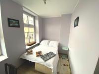 Posteľ alebo postele v izbe v ubytovaní Gdańskie Apartamenty - Apartament Targ Rybny z widokiem na Motławę