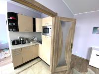 Kuchyňa alebo kuchynka v ubytovaní Gdańskie Apartamenty - Apartament Targ Rybny z widokiem na Motławę