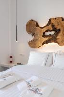 Posteľ alebo postele v izbe v ubytovaní Sunset Paraportiani Rooms