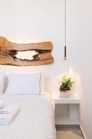 Posteľ alebo postele v izbe v ubytovaní Sunset Paraportiani Rooms
