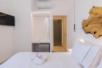 Posteľ alebo postele v izbe v ubytovaní Sunset Paraportiani Rooms