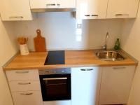 Kuchyň nebo kuchyňský kout v ubytování Apartments Kuzmanic