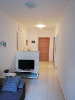 Televízia a/alebo spoločenská miestnosť v ubytovaní Petra apartment