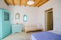 Postel nebo postele na pokoji v ubytování Dimitrakis Guesthouse