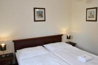 Postel nebo postele na pokoji v ubytování Hotel Buchlovice