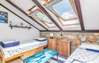 Posteľ alebo postele v izbe v ubytovaní Stone House Knez