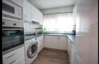Kuchyňa alebo kuchynka v ubytovaní La casita de lola